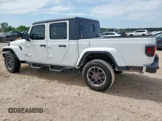 2023 Jeep Gladiator Overland z VIN 1C6HJTFG0PL514615, wystawiony jako Copart lot #57795945 z przebiegiem 32 427 mil mil oraz Czysty tytuł • Clean title. Historia ofert i sprzedaży dostępna na DreamBid. Obrazek 2.