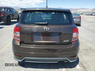 2011 Scion xD z VIN JTKKU4B44B1010587, wystawiony jako Copart lot #55654225 z przebiegiem 87 926 mil mil oraz Szkody całkowita. Historia ofert i sprzedaży dostępna na DreamBid. Obrazek 6.