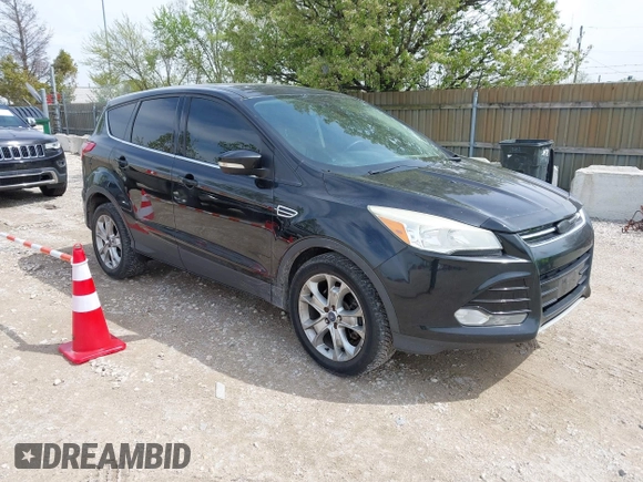 2013 Ford Escape SEL with VIN 1FMCU9H92DUA45282, listed as a IAAI auction lot 42184946 with 96,512 mi miles and . Bid and sale history available at DreamBid. Image 1.