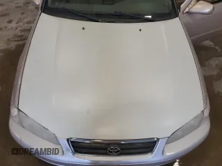 2000 Toyota Camry CE z VIN 4T1BG22K2YU742415, wystawiony jako Copart lot #55763165 z przebiegiem 245 821 mil mil oraz Czysty tytuł • Clean title. Historia ofert i sprzedaży dostępna na DreamBid. Obrazek 11.