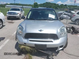 2011 MINI Countryman S with VIN WMWZC5C53BWL53641, listed as a IAAI auction lot 42547084 with 171,647 mi miles and . Bid and sale history available at DreamBid. Image 12.