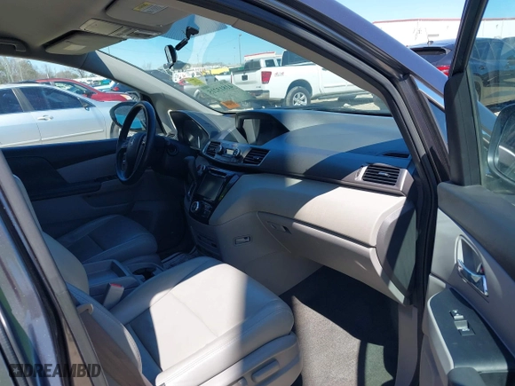 2016 Honda Odyssey SE with VIN 5FNRL5H36GB124005, listed as a IAAI auction lot 41813215 with 149,697 mi miles. Bid and sale history available at carsss.com. Image 5.