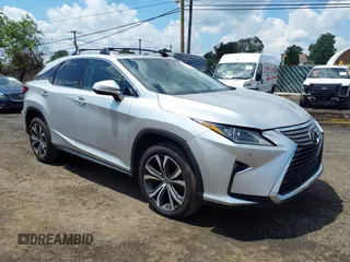 2018 Lexus RX 350 z VIN 2T2BZMCA8JC142223, wystawiony jako IAAI lot #42549701 z przebiegiem 143 910 mil mil oraz . Historia ofert i sprzedaży dostępna na DreamBid. Obrazek 1.