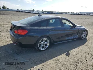 2015 BMW 4 Series 435i xDrive with VIN WBA4B3C51FGV48817, listed as a Copart auction lot 52997265 with 77,812 mi miles and Salvage Title. Bid and sale history available at DreamBid. Image 3.