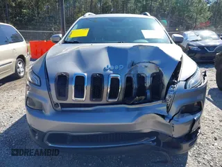 2016 Jeep Cherokee Limited with VIN 1C4PJLDB8GW239294, listed as a IAAI auction lot 41675712 with 140,491 mi miles. Bid and sale history available at carsss.com. Image 12.