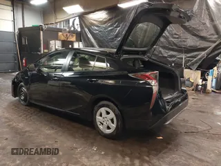 2017 Toyota Prius Two with VIN JTDKBRFU1H3031995, listed as a IAAI auction lot 41560653 with 155,092 mi miles and . Bid and sale history available at DreamBid. Image 3.