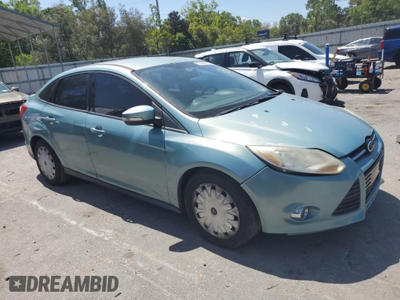 2012 Ford Focus SE with VIN 1FAHP3F29CL428201, listed as a Copart auction lot 52566905 with 209,909 mi miles and Salvage title. Bid and sale history available at DreamBid. Image 4.