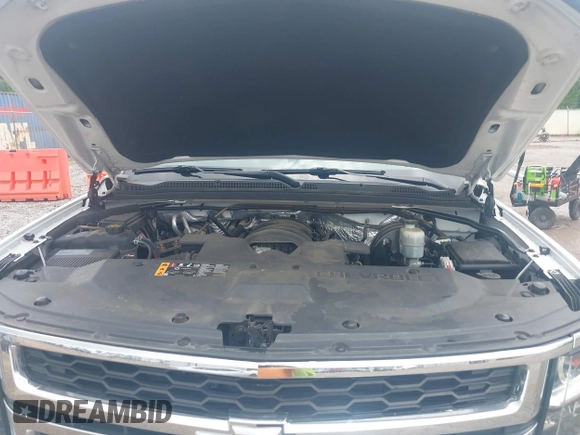 2017 Chevrolet Tahoe LS with VIN 1GNSCAKC7HR342637, listed as a IAAI auction lot 42335097 with 149,736 mi miles and . Bid and sale history available at DreamBid. Image 10.
