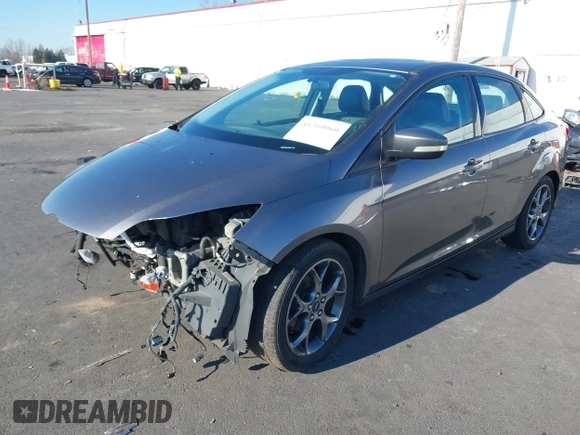 2014 Ford Focus SE with VIN 1FADP3F24EL199735, listed as a IAAI auction lot 41360060 with 115,814 mi miles and . Bid and sale history available at carsss.com. Image 2.
