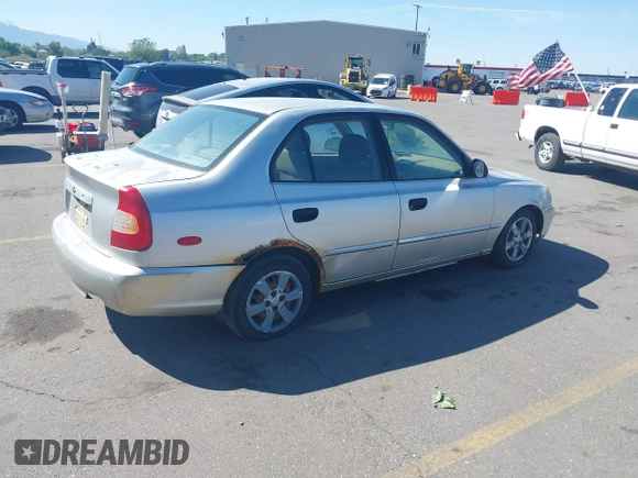 2002 Hyundai Accent GL z VIN KMHCG45C62U336245, wystawiony jako IAAI lot #42312838 z przebiegiem 310 753 mil mil oraz . Historia ofert i sprzedaży dostępna na DreamBid. Obrazek 4.