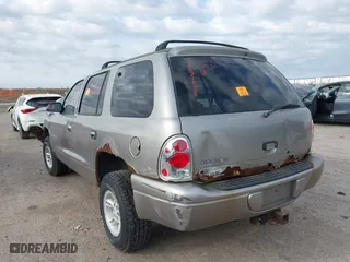 1999 Dodge Durango with VIN 1B4HS28Y9XF672873, listed as a IAAI auction lot 41919377 with 1 mi miles. Bid and sale history available at carsss.com. Image 3.