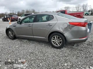 2013 Kia Optima LX z VIN 5XXGM4A70DG251868, wystawiony jako Copart lot #52921925 z przebiegiem 114 318 mil mil oraz Szkody całkowita. Historia ofert i sprzedaży dostępna na DreamBid. Obrazek 2.