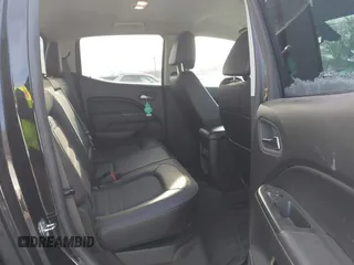 2015 GMC Canyon 4WD SLE z VIN 1GTG6BE31F1270675, wystawiony jako IAAI lot #41407183 z przebiegiem 143 117 mil mil oraz . Historia ofert i sprzedaży dostępna na DreamBid. Obrazek 8.