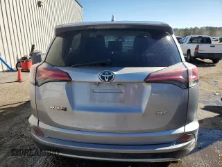 2018 Toyota RAV4 XLE with VIN JTMWFREV1JJ205906, listed as a Copart auction lot 84700564 with 64,953 mi miles and Salvage Title. Bid and sale history available at DreamBid. Image 6.