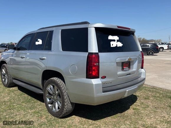 2020 Chevrolet Tahoe LT with VIN 1GNSKBKCXLR262492, listed as a Copart auction lot 53185735 with 99,627 mi miles and Clean Title. Bid and sale history available at carsss.com. Image 3.