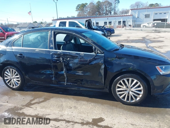 2015 Volkswagen Jetta Sedan 1.8T SE w/Connectivity with VIN 3VWD07AJ6FM303403, listed as a IAAI auction lot 41330778 with 150,949 mi miles. Bid and sale history available at carsss.com. Image 6.