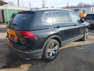 2020 Volkswagen Tiguan SE with VIN 3VV2B7AXXLM076870, listed as a IAAI auction lot 41811623 with 37,064 mi miles. Bid and sale history available at carsss.com. Image 4.
