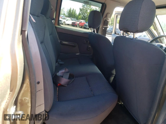 2002 Nissan Frontier SVE with VIN 1N6MD27Y82C392057, listed as a Copart auction lot 63640405 with 167,092 mi miles and Clean title. Bid and sale history available at DreamBid. Image 10.