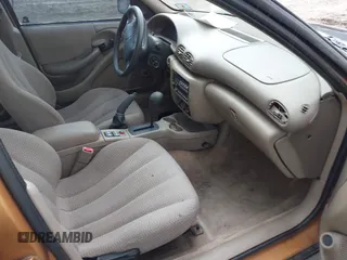 2002 Pontiac Sunfire SE z VIN 1G2JB524427245927, wystawiony jako IAAI lot #42346448 z przebiegiem 179 412 mil mil oraz . Historia ofert i sprzedaży dostępna na DreamBid. Obrazek 5.