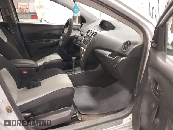 2009 Toyota Yaris with VIN JTDBT903391338448, listed as a IAAI auction lot 41583457 with 182,346 mi miles. Bid and sale history available at carsss.com. Image 5.