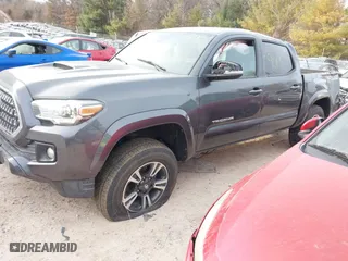 2019 Toyota Tacoma 4WD SR with VIN 3TMCZ5AN6KM199663, listed as a IAAI auction lot 41429013 with 73,574 mi miles. Bid and sale history available at carsss.com. Image 23.