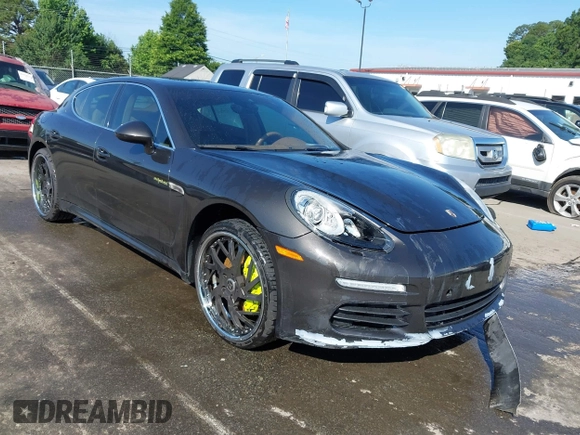 2014 Porsche Panamera S E-Hybrid with VIN WP0AD2A76EL044591, listed as a IAAI auction lot 42436817 with 89,009 mi miles and . Bid and sale history available at DreamBid. Image 1.