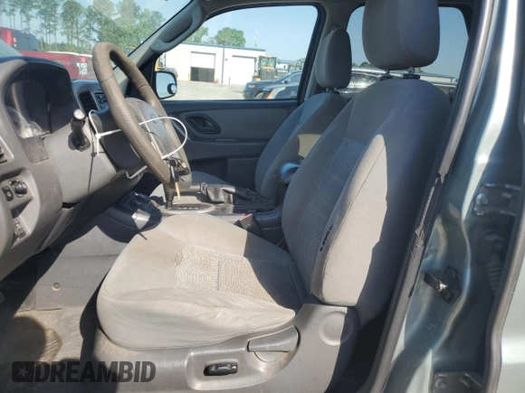 2005 Ford Escape Hybrid z VIN 1FMCU95HX5KB95634, wystawiony jako Copart lot #56513595 z przebiegiem 228 188 mil mil oraz Czysty tytuł • Clean title. Historia ofert i sprzedaży dostępna na DreamBid. Obrazek 7.