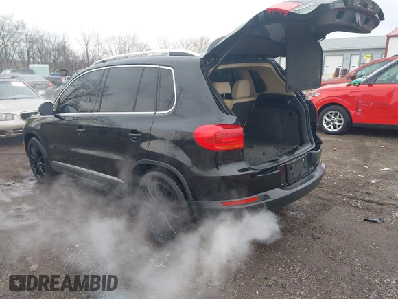 2012 Volkswagen Tiguan SE with VIN WVGAV7AX0CW602713, listed as a IAAI auction lot 41558520 with 95,678 mi miles and . Bid and sale history available at DreamBid. Image 3.