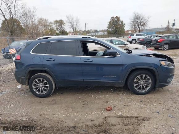 2019 Jeep Cherokee Latitude Plus with VIN 1C4PJLLB0KD434960, listed as a IAAI auction lot 40851354 with 111,989 mi miles. Bid and sale history available at carsss.com. Image 13.