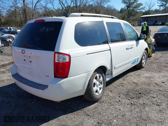 2009 Kia Sedona LX with VIN KNDMB233096312990, listed as a IAAI auction lot 41261428 with 254,323 mi miles. Bid and sale history available at carsss.com. Image 4.
