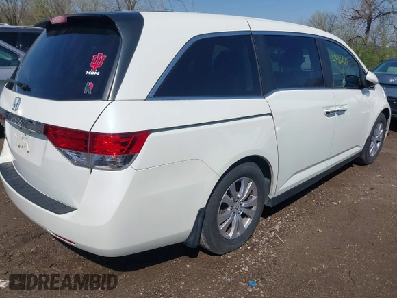 2016 Honda Odyssey EX-L with VIN 5FNRL5H68GB160563, listed as a IAAI auction lot 41962881 with 121,429 mi miles. Bid and sale history available at carsss.com. Image 4.