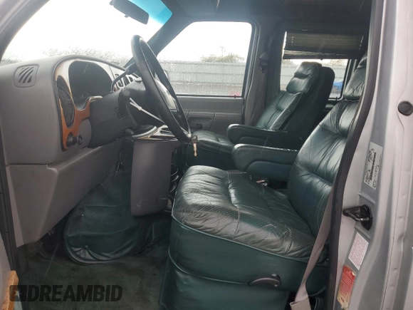 1999 Ford Econoline Cargo Recreational with VIN 1FDRE14L3XHA31771, listed as a Copart auction lot 49973795 with 220,268 mi miles and Salvage title. Bid and sale history available at DreamBid. Image 7.