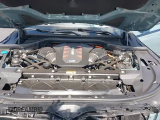 2023 BMW XM z VIN 5YM23CS00P9R58616, wystawiony jako IAAI lot #42205655 z przebiegiem 19 971 mil mil oraz . Historia ofert i sprzedaży dostępna na DreamBid. Obrazek 10.