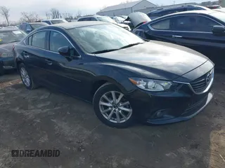 2015 Mazda 6 i Sport with VIN JM1GJ1U5XF1214570, listed as a IAAI auction lot 41003789 with 99,844 mi miles. Bid and sale history available at carsss.com. Image 1.