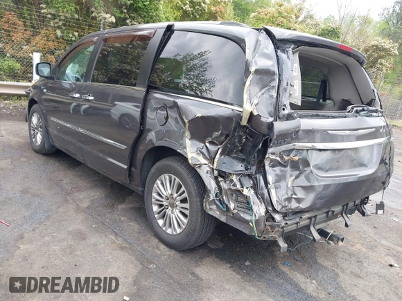 2014 Chrysler Town & Country Touring L with VIN 2C4RC1CG6ER195502, listed as a IAAI auction lot 42009629 with 126,157 mi miles and . Bid and sale history available at DreamBid. Image 3.