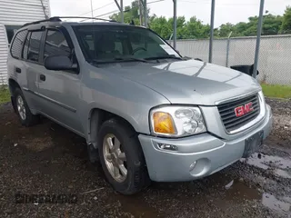 2007 GMC Envoy SLE z VIN 1GKDT13S272232176, wystawiony jako IAAI lot #42194144 z przebiegiem 160 461 mil mil oraz . Historia ofert i sprzedaży dostępna na DreamBid. Obrazek 1.