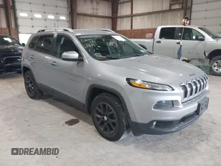 2016 Jeep Cherokee Latitude z VIN 1C4PJMCB9GW148882, wystawiony jako IAAI lot #42210237 z przebiegiem 124 441 mil mil oraz . Historia ofert i sprzedaży dostępna na DreamBid. Obrazek 1.