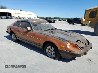 1982 Datsun 280ZX 2+2 z VIN JN1HZ06S8CX428785, wystawiony jako Copart lot #80942274 z przebiegiem 88 574 mil mil oraz Tytuł czysty. Historia ofert i sprzedaży dostępna na DreamBid. Obrazek 4.