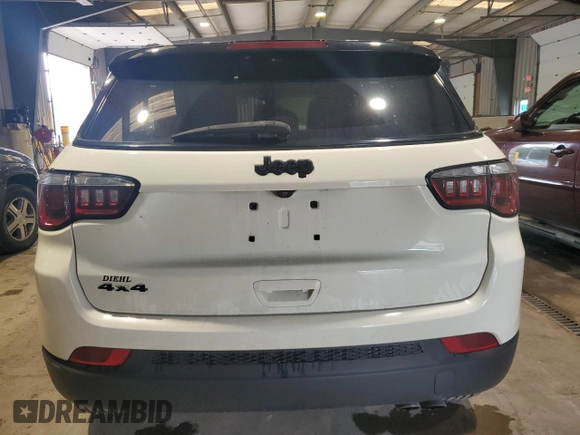 2020 Jeep Compass Latitude with VIN 3C4NJDBB1LT157875, listed as a Copart auction lot 60310155 with 81,817 mi miles and Salvage title. Bid and sale history available at DreamBid. Image 6.