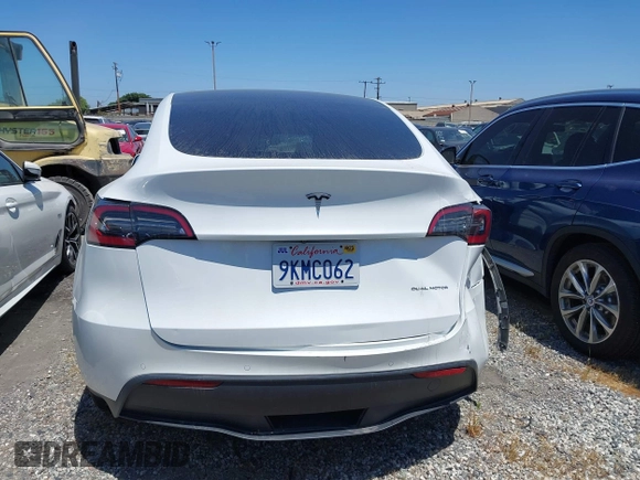 2022 Tesla Model Y Long Range with VIN 7SAYGDEE8NF480939, listed as a IAAI auction lot 41808863 with 62,607 mi miles and . Bid and sale history available at carsss.com. Image 17.