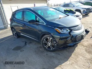 2021 Chevrolet Bolt EV Premier z VIN 1G1FZ6S00M4100574, wystawiony jako IAAI lot #41787225 z przebiegiem 70 941 mil mil oraz . Historia ofert i sprzedaży dostępna na DreamBid. Obrazek 1.