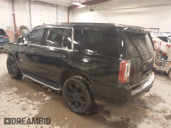 2016 GMC Yukon SLE with VIN 1GKS2AKC1GR276262, listed as a IAAI auction lot 41336378 with 213,182 mi miles. Bid and sale history available at carsss.com. Image 3.