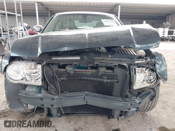 2006 Chrysler 300 C with VIN 2C3KA63H66H318725, listed as a IAAI auction lot 41629398 with 157,367 mi miles. Bid and sale history available at carsss.com. Image 13.