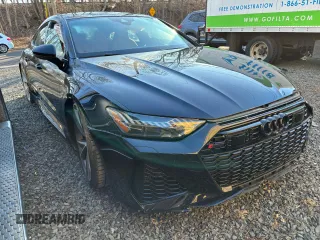 2021 Audi RS 7 z VIN WUAPCBF25MN902908, wystawiony jako Copart lot #49883175 z przebiegiem 49 025 mil mil oraz Tytuł czysty. Historia ofert i sprzedaży dostępna na DreamBid. Obrazek 1.