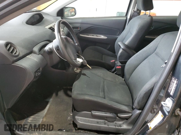 2009 Toyota Yaris z VIN JTDBT903991335683, wystawiony jako Copart lot #52565155 z przebiegiem 143 737 mil mil oraz Szkody całkowita. Historia ofert i sprzedaży dostępna na DreamBid. Obrazek 7.