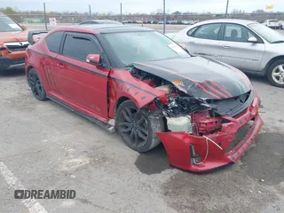 2016 Scion tC with VIN JTKJF5C74GJ026588, listed as a IAAI auction lot 41582253 with 74,023 mi miles. Bid and sale history available at carsss.com. Image 1.