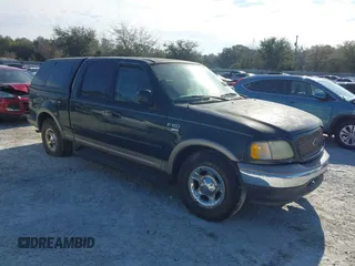 2003 Ford F-150 XLT with VIN 1FTRW07L53KA64064, listed as a IAAI auction lot 41697350 with 227,114 mi miles. Bid and sale history available at carsss.com. Image 1.