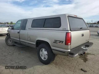 1998 Chevrolet Silverado 1500 with VIN 1GCEK19R1WE171942, listed as a Copart auction lot 46476505 with 219,527 mi miles and Salvage Title. Bid and sale history available at DreamBid. Image 2.