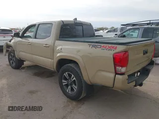 2017 Toyota Tacoma SR5 with VIN 3TMCZ5AN2HM063328, listed as a IAAI auction lot 41541775 with 137,610 mi miles and . Bid and sale history available at DreamBid. Image 3.