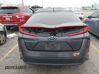 2018 Toyota Prius Plus with VIN JTDKARFP5J3095377, listed as a IAAI auction lot 42153552 with 77,255 mi miles and . Bid and sale history available at DreamBid. Image 17.
